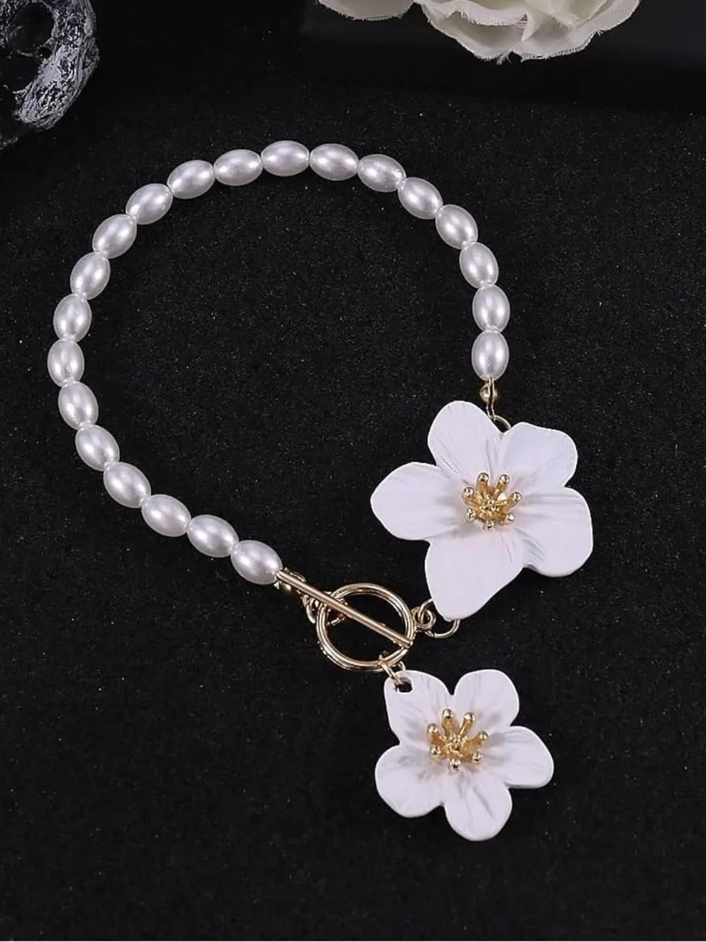 Anthropologie White Pearl Bracelet with Gold Floral Charms